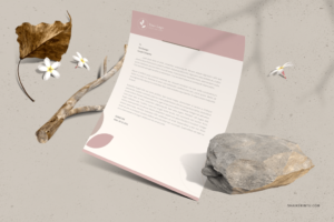 US Letter mockup with stone, branches and flowers